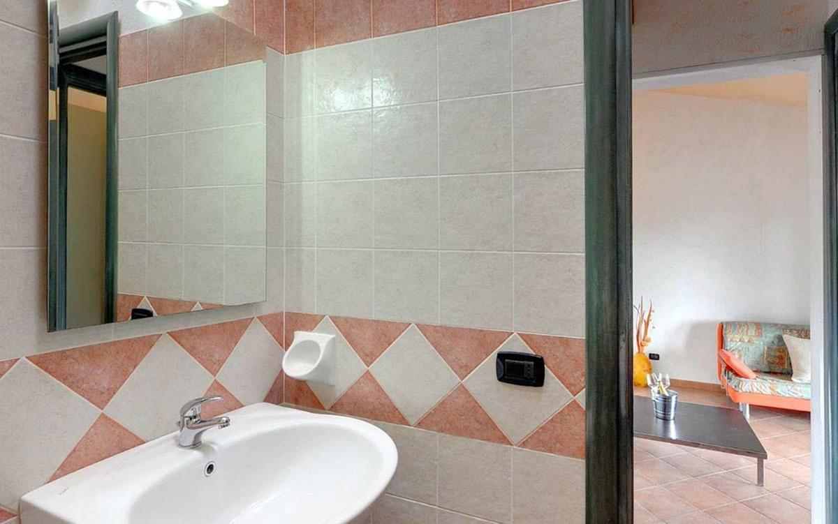 וילאפוצו Residence Il Borgo Di Porto Corallo מראה חיצוני תמונה