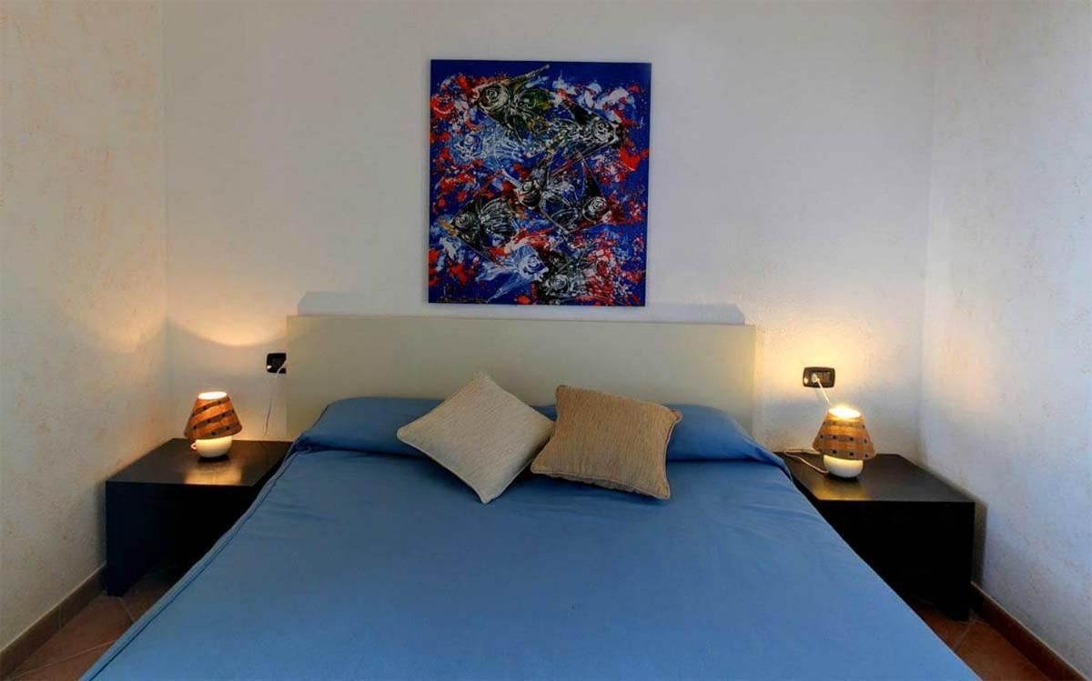 וילאפוצו Residence Il Borgo Di Porto Corallo מראה חיצוני תמונה