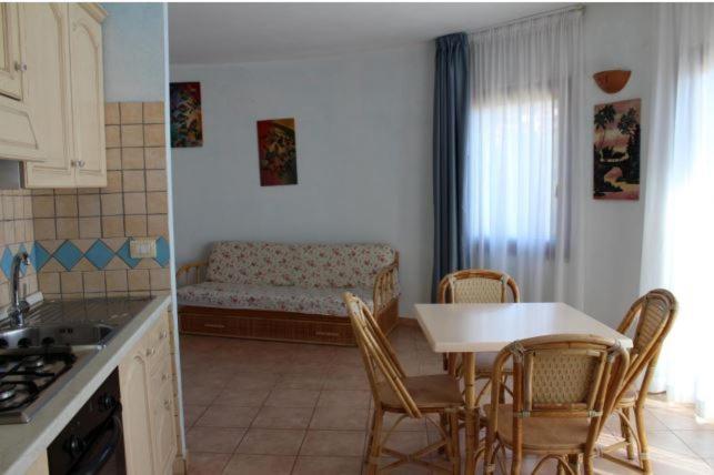 וילאפוצו Residence Il Borgo Di Porto Corallo מראה חיצוני תמונה