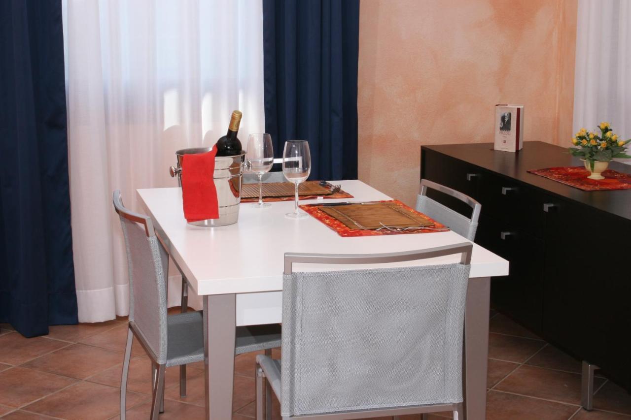 וילאפוצו Residence Il Borgo Di Porto Corallo מראה חיצוני תמונה
