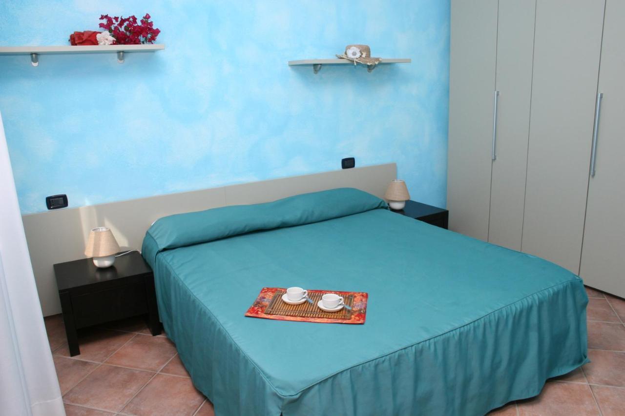 וילאפוצו Residence Il Borgo Di Porto Corallo מראה חיצוני תמונה
