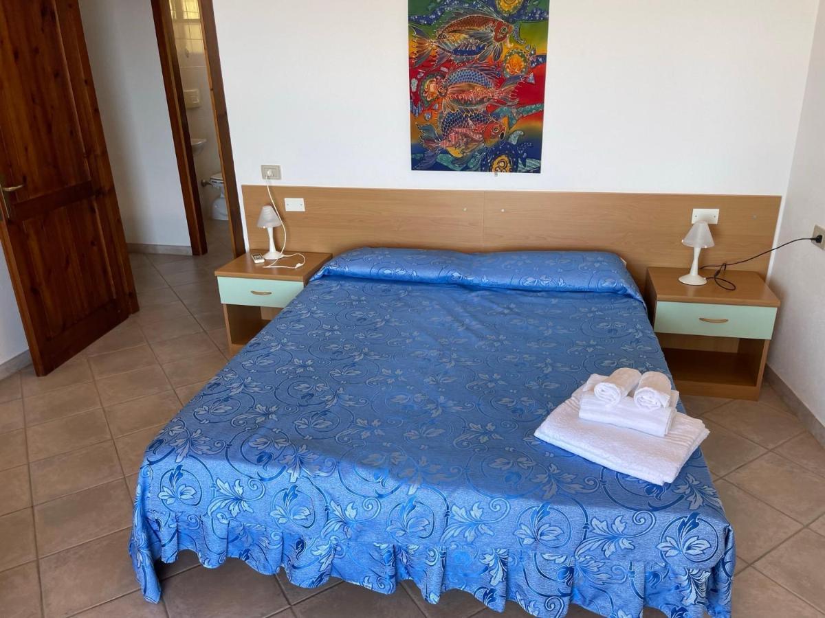וילאפוצו Residence Il Borgo Di Porto Corallo מראה חיצוני תמונה