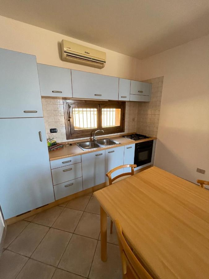 וילאפוצו Residence Il Borgo Di Porto Corallo מראה חיצוני תמונה