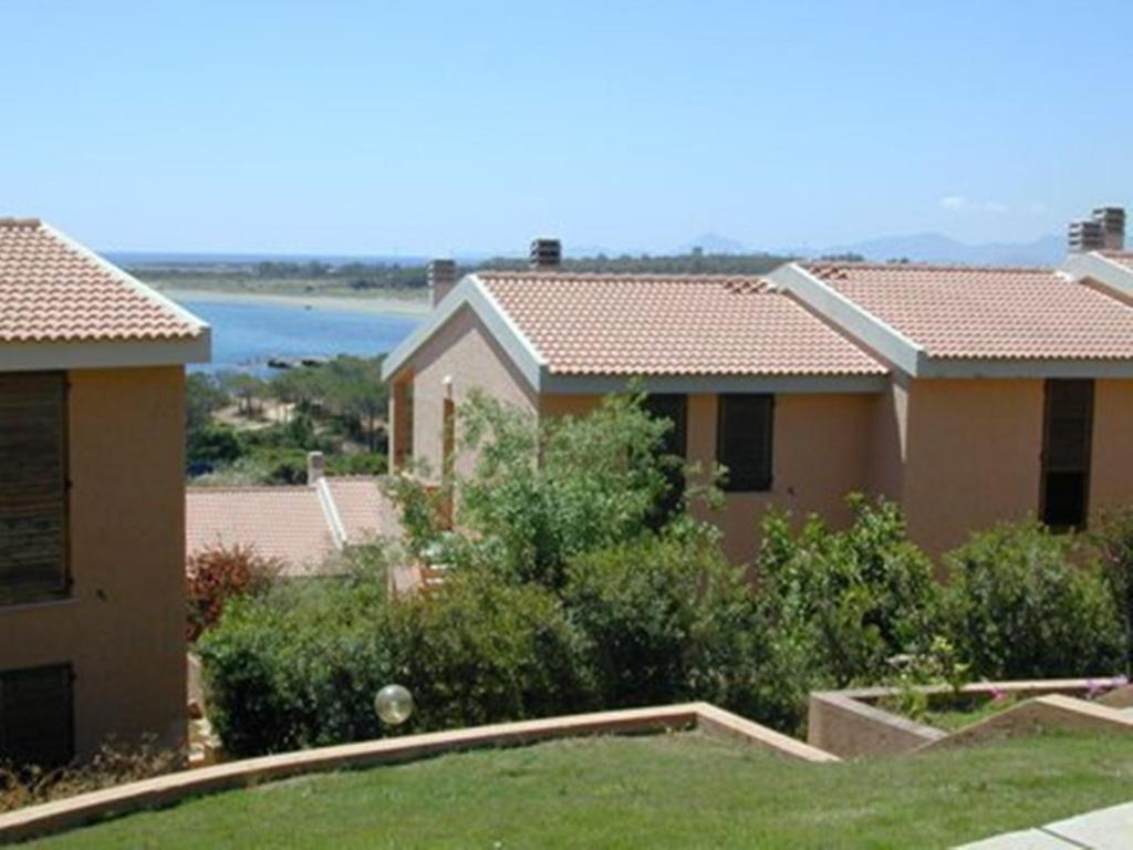 וילאפוצו Residence Il Borgo Di Porto Corallo חדר תמונה