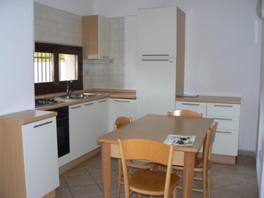 וילאפוצו Residence Il Borgo Di Porto Corallo חדר תמונה